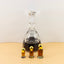 Oil bottles and elixir by The perfumist