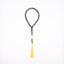 Buy agarwood prayer beads with a yellow tassel displayed on a white background