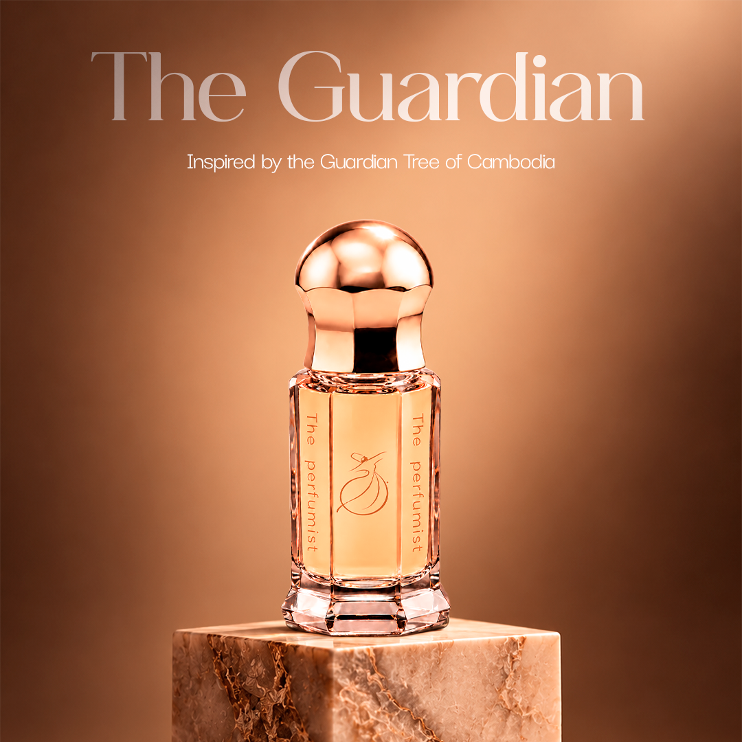 The Guardian golden perfume oil bottle from The Tree of Life on a stone pedestal