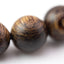 Authentic agarwood bracelet online in a macro view showing striped 8mm bead grain