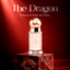 The Dragon perfume oil bottle from The Tree of Life on a red marble pedestal