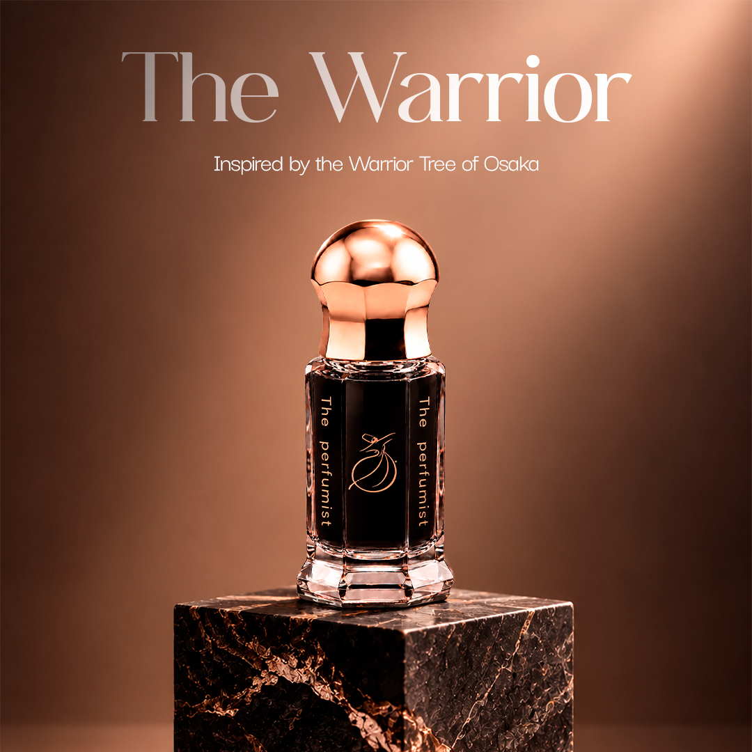 The Warrior dark perfume oil bottle from The Tree of Life on black marble
